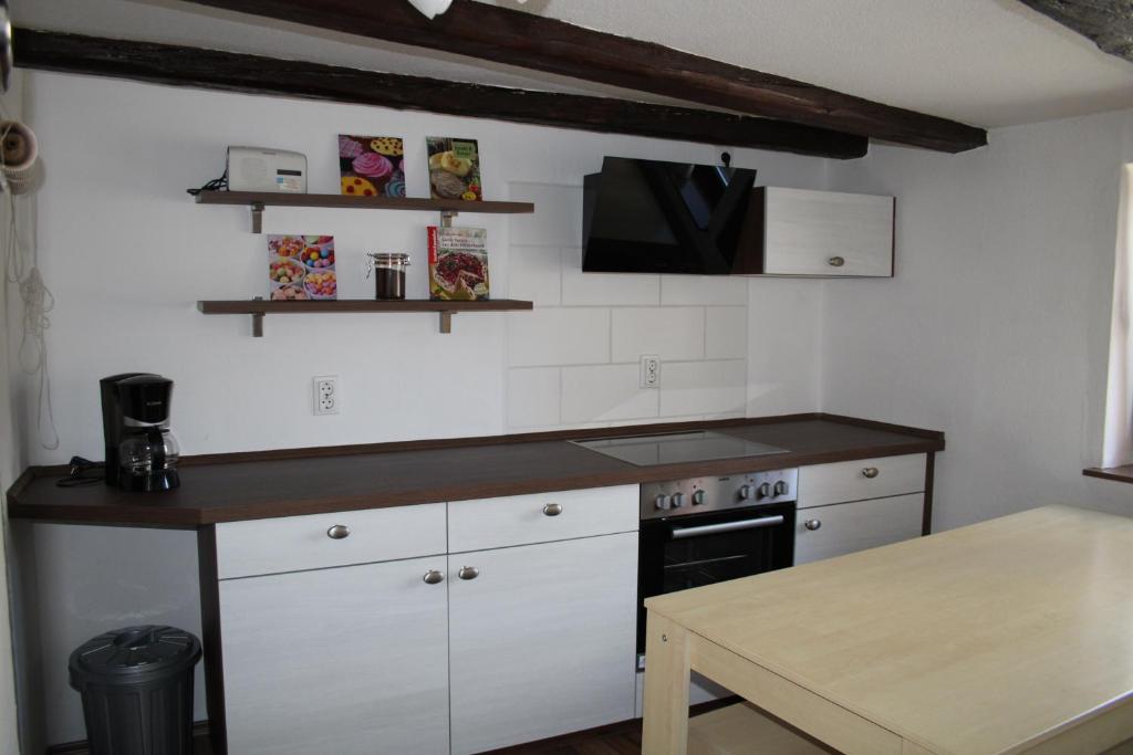 Kuchyň nebo kuchyňský kout v ubytování FerienwohnungQuedlinburg