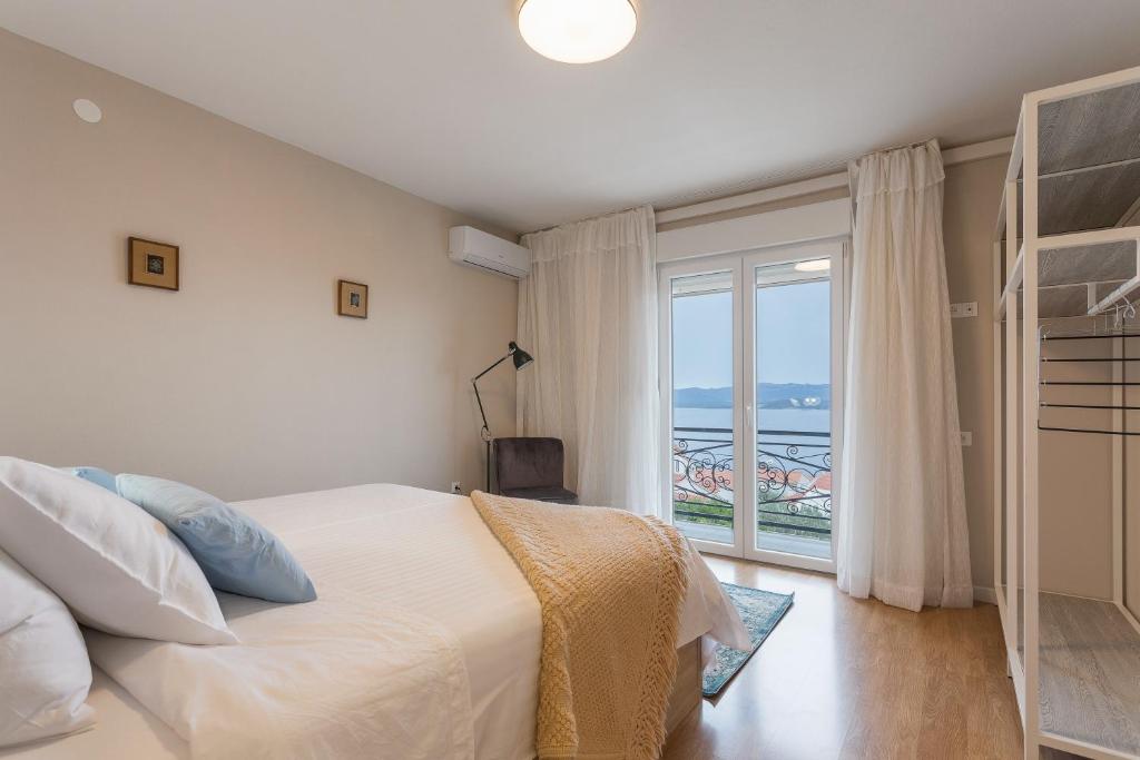 Posteľ alebo postele v izbe v ubytovaní The Island Place