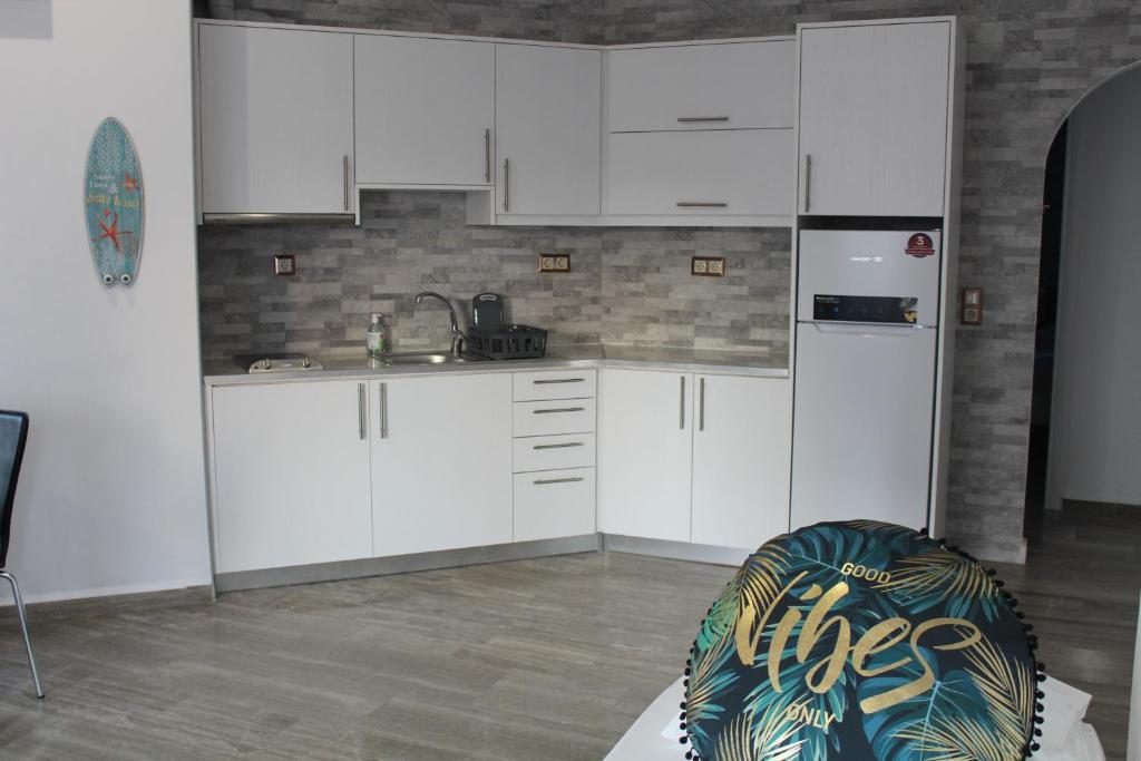 Kuchyň nebo kuchyňský kout v ubytování Bay View Apartments