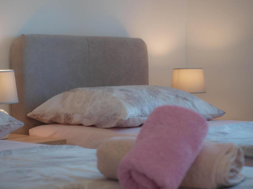 Postel nebo postele na pokoji v ubytování Apartmani Goga 2
