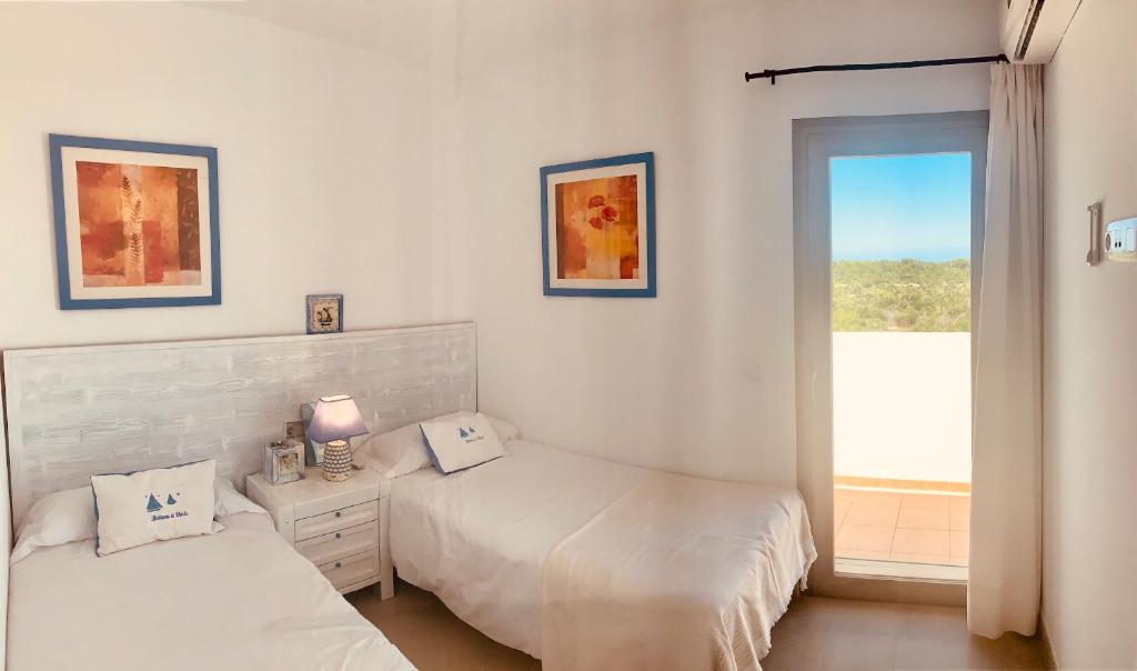 Postel nebo postele na pokoji v ubytování Villa Lauvic