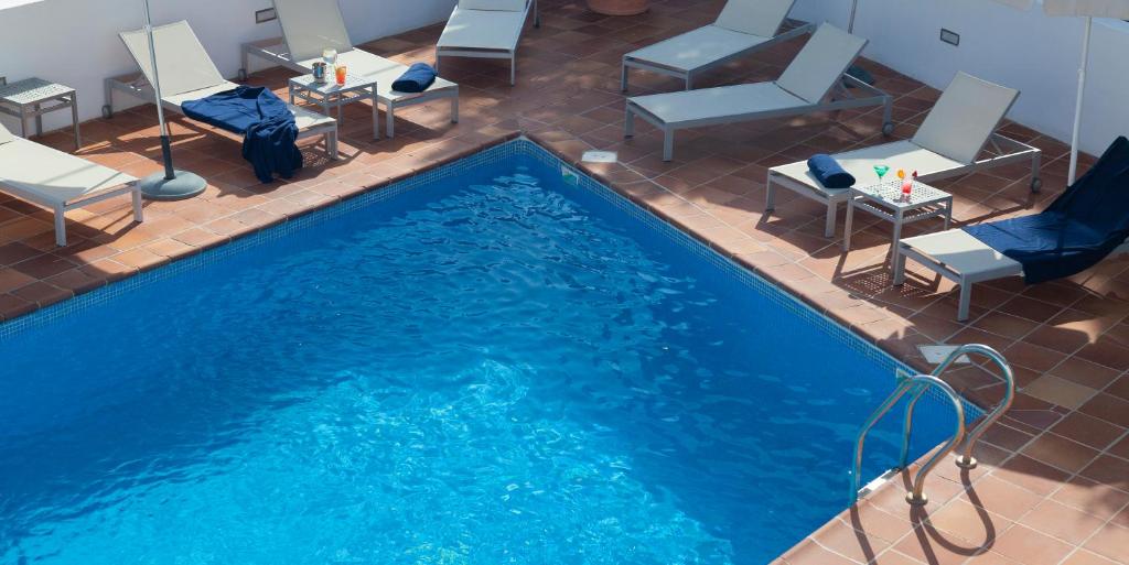 Bazén v ubytování Hotel Roca Plana nebo v jeho okolí