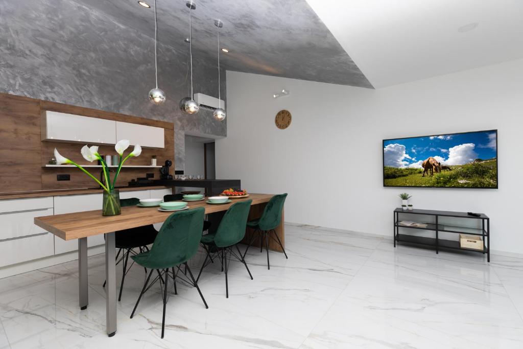 TV a/nebo společenská místnost v ubytování Apartments Ban