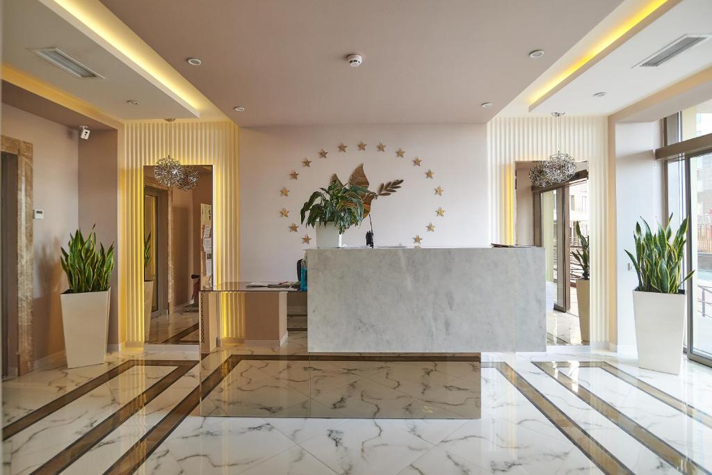 Vstupní hala nebo recepce v ubytování Atmosfera Hotel