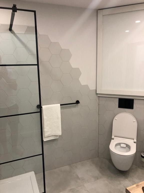 Kúpeľňa v ubytovaní Apartament Łeba Kosciuszki Centrum