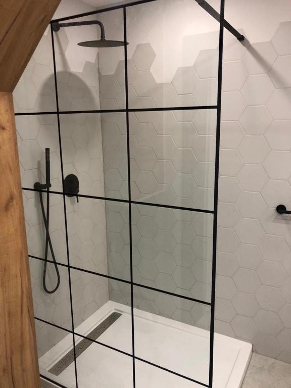 Kúpeľňa v ubytovaní Apartament Łeba Kosciuszki Centrum