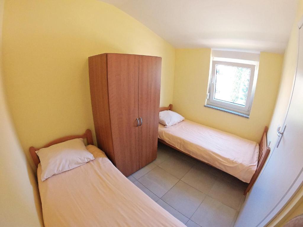 Łóżko lub łóżka w pokoju w obiekcie Apartments SOLARIS - with PRIVATE PARKING