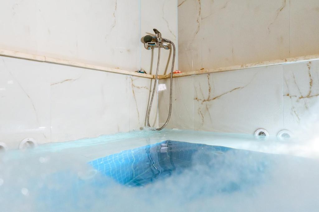 Koupelna v ubytování Konmari Boutique Suites