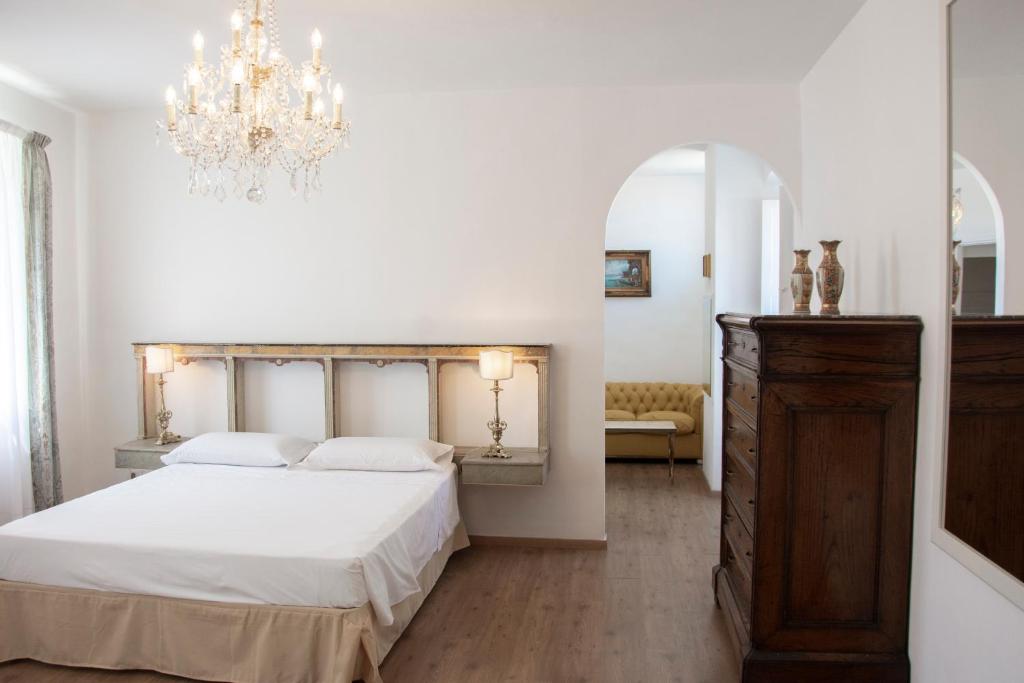 Postel nebo postele na pokoji v ubytování Il Palazzetto