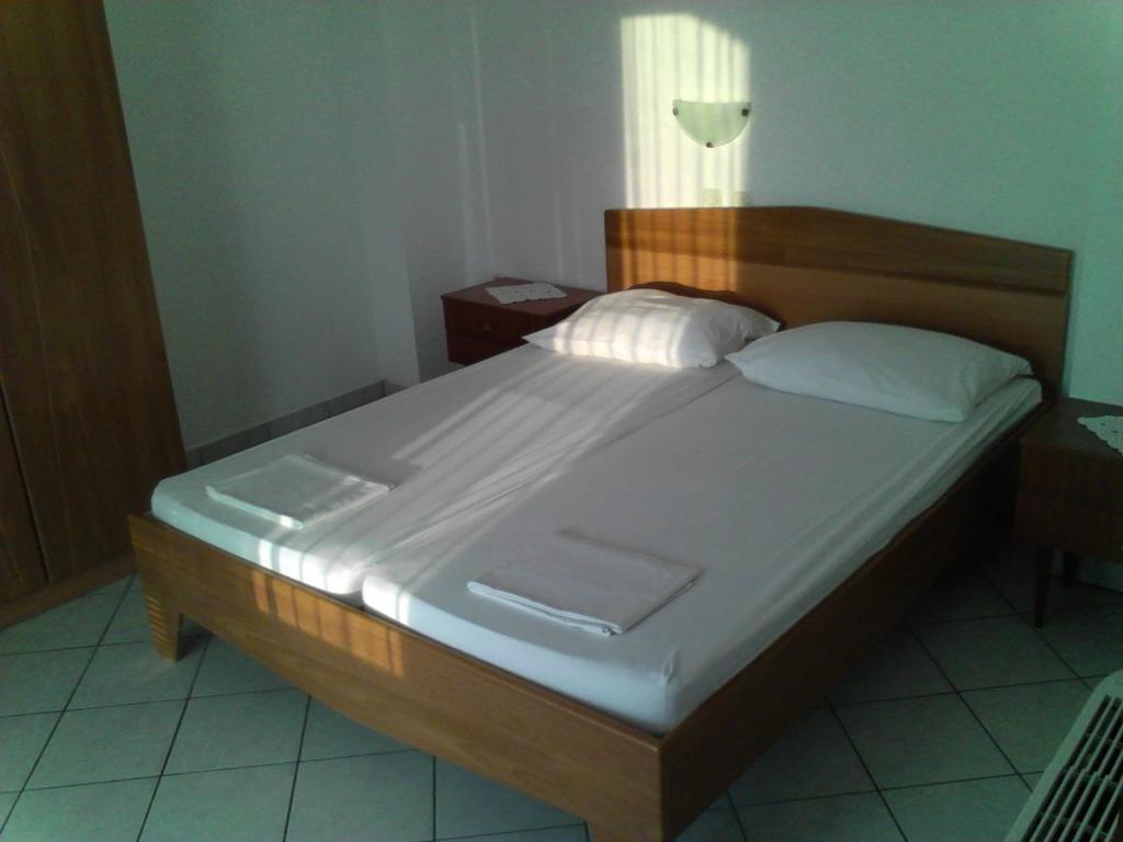 Postel nebo postele na pokoji v ubytování Guest House Frane