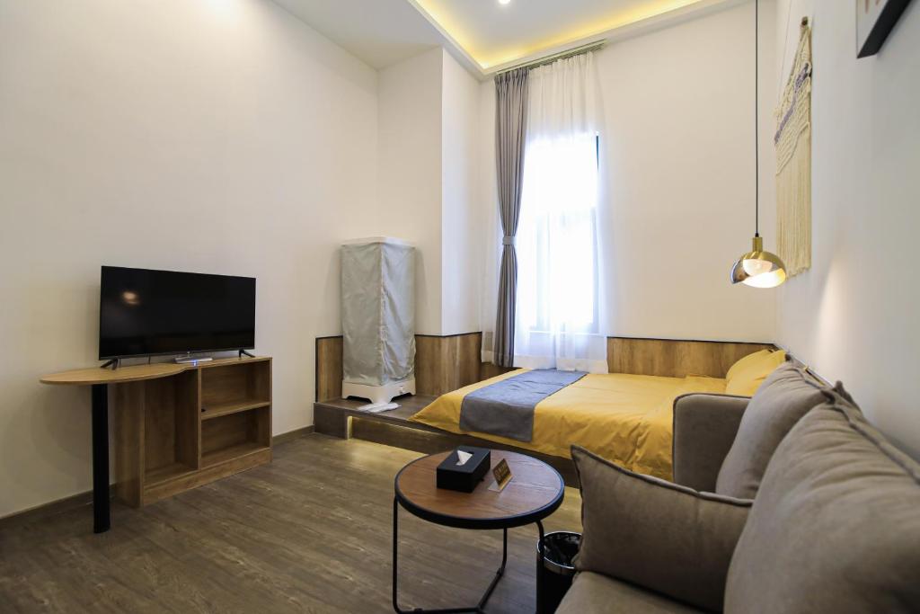 TV a/nebo společenská místnost v ubytování Shenzhen Ruiya Japanese-style Hotel Huaqiang North