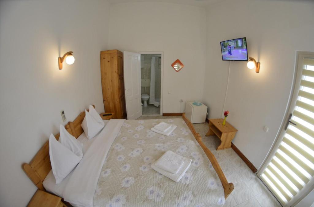 Postel nebo postele na pokoji v ubytování Complex Credo