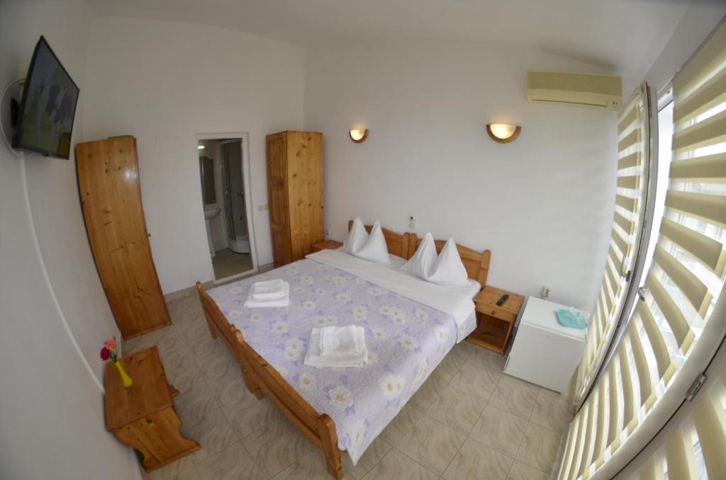 Postel nebo postele na pokoji v ubytování Complex Credo