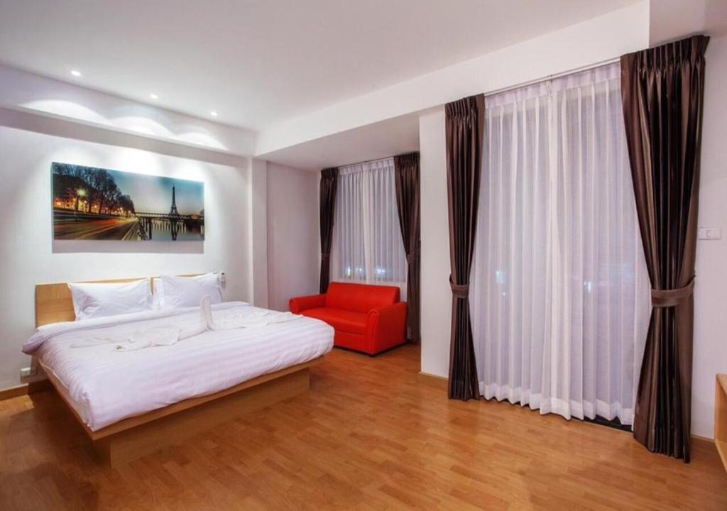 Postel nebo postele na pokoji v ubytování Buk Inn Hotel SHA Plus