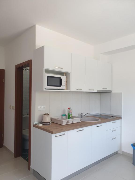 Kuchyňa alebo kuchynka v ubytovaní Guest house Lavanda 2