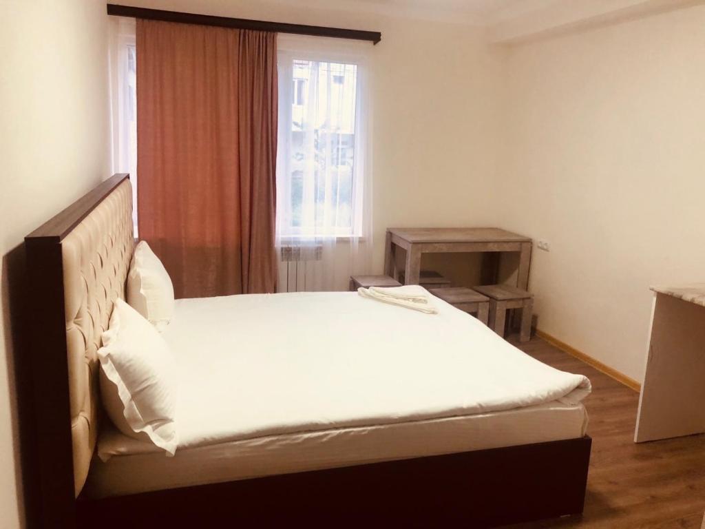 Postel nebo postele na pokoji v ubytování Mini Hotel Sevan