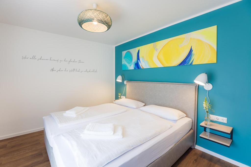 Postel nebo postele na pokoji v ubytování Hotel & Restaurant Mühlenglück