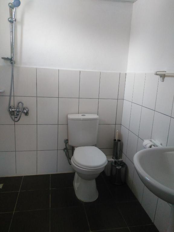 Koupelna v ubytování UĞUR BEACH HOTEL