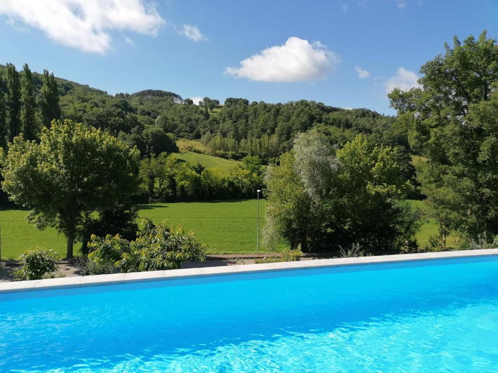 Bazén v ubytování B&B VILLA GINEVRA nebo v jeho okolí