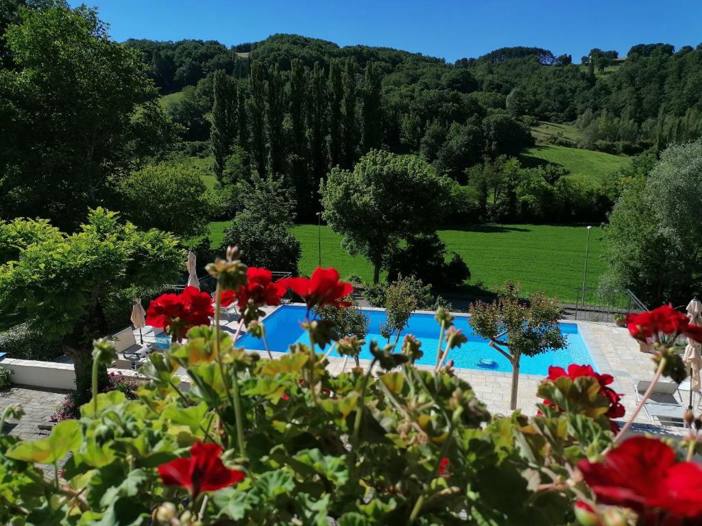 Bazén v ubytování B&B VILLA GINEVRA nebo v jeho okolí
