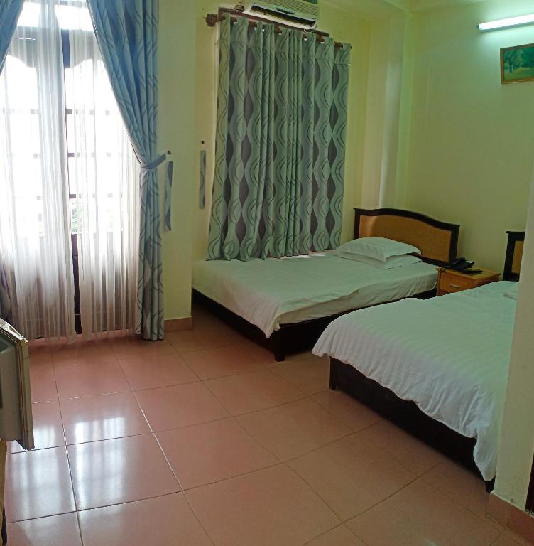 Cat Phu Hotel - Vierbettzimmer