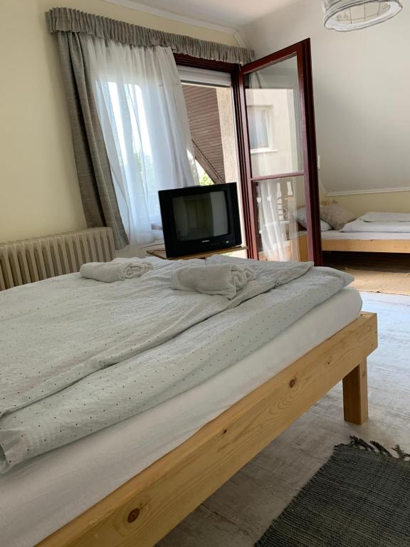 Łóżko lub łóżka w pokoju w obiekcie WhiteHouse Alsoors