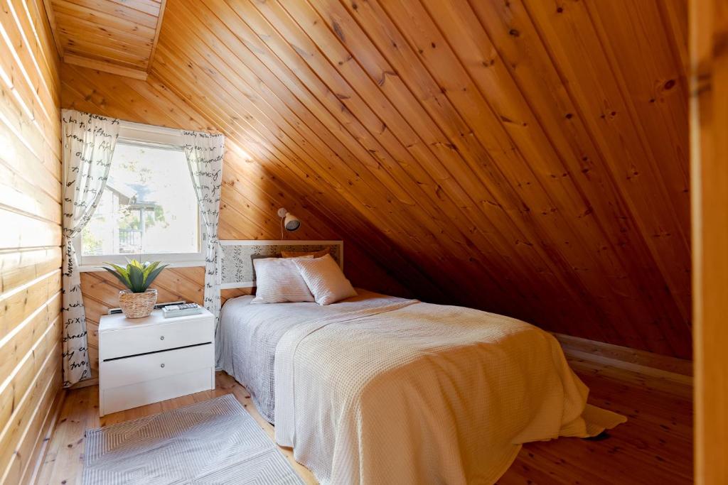 Postel nebo postele na pokoji v ubytování Villa Lumi 10 henkilölle, Himos Länsihuippu