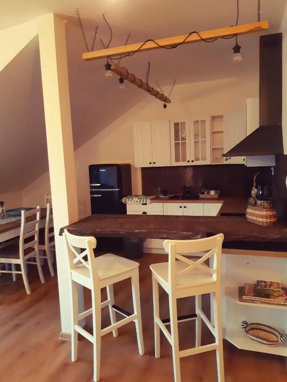 Kuchyň nebo kuchyňský kout v ubytování Apartmány na náměstí