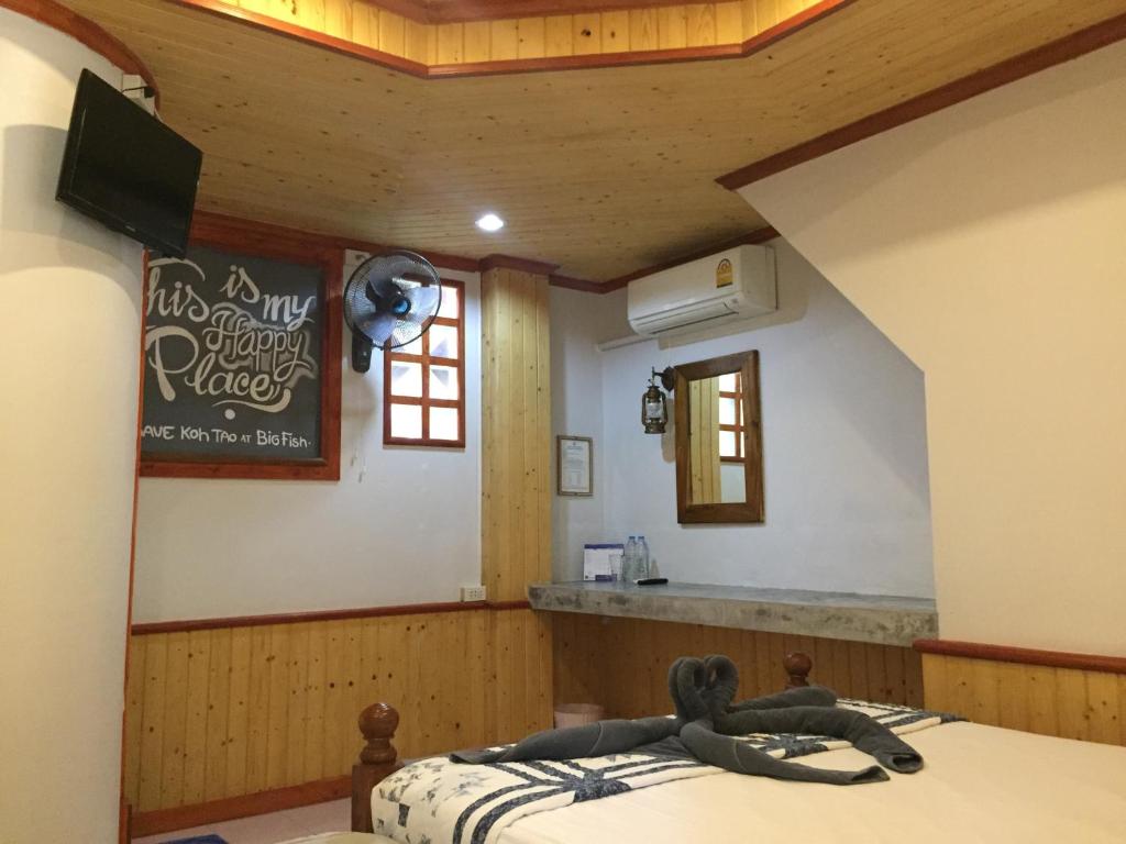 Postel nebo postele na pokoji v ubytování Big Fish Resort Koh Tao