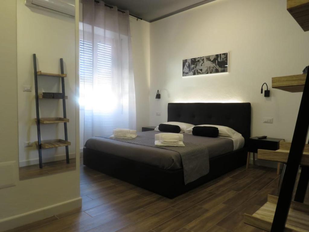 Postel nebo postele na pokoji v ubytování B&b Angolo 29