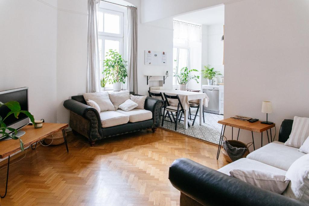 A seating area at Comfortable & Spacious Lodz City Center Apartment
