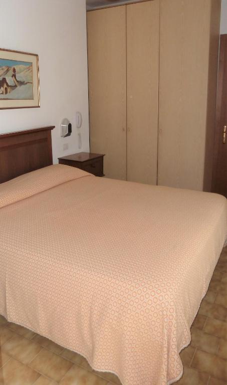 Postel nebo postele na pokoji v ubytování Camping Alpino - Nature Village