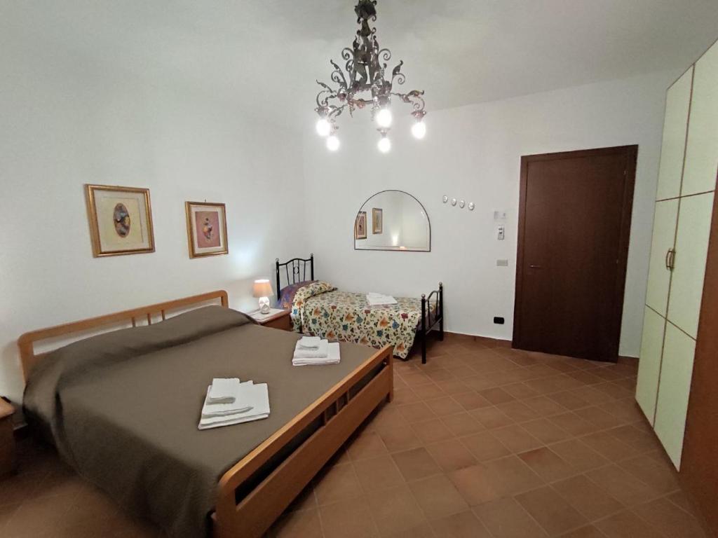 Postel nebo postele na pokoji v ubytování Salento Apartment