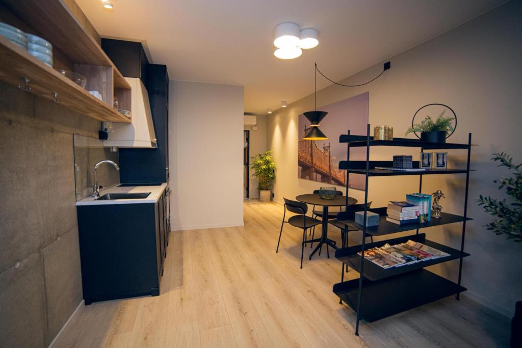 Kuchyň nebo kuchyňský kout v ubytování Home Again Apartments Kirkegata
