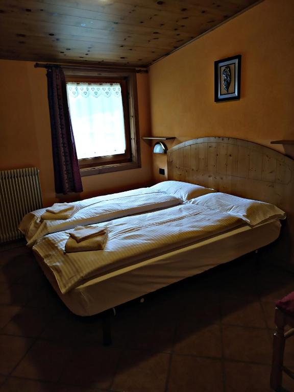 Łóżko lub łóżka w pokoju w obiekcie Wood Apartments