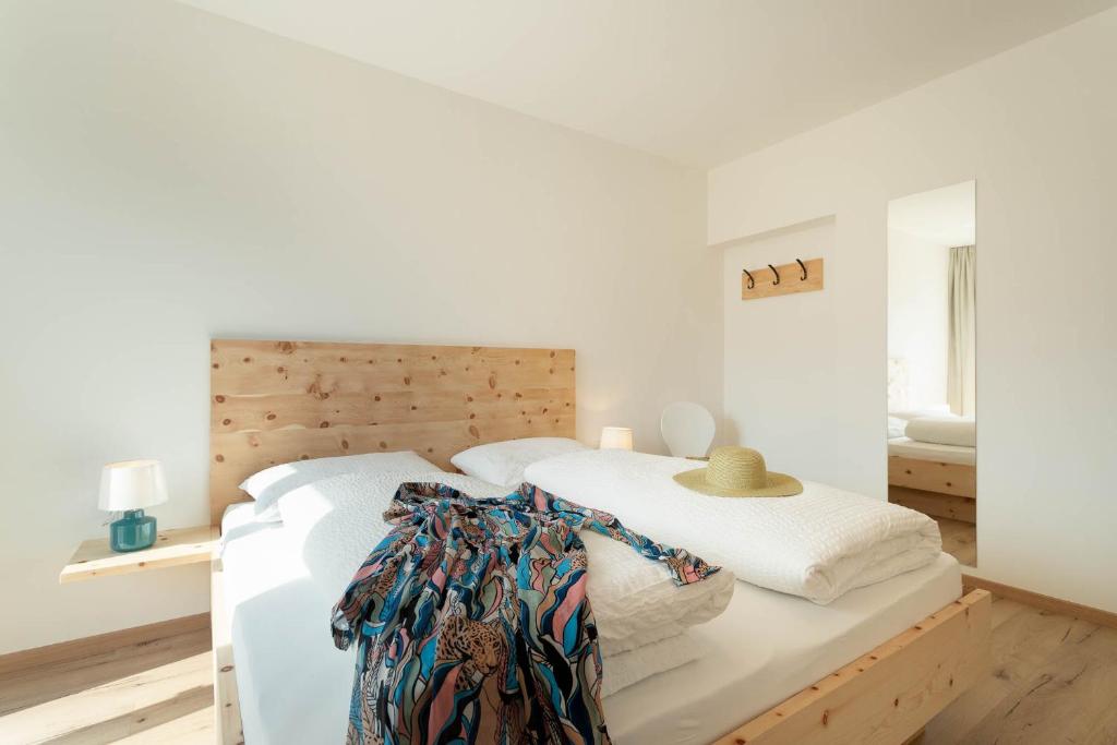 Postel nebo postele na pokoji v ubytování MeranoView Apartments