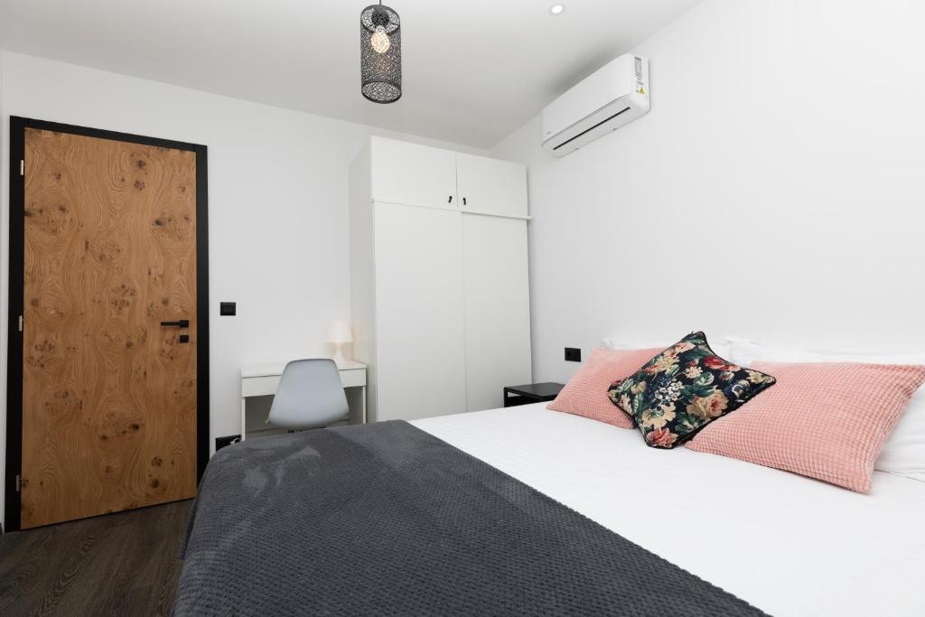 Posteľ alebo postele v izbe v ubytovaní Luxury Apartman Tinel