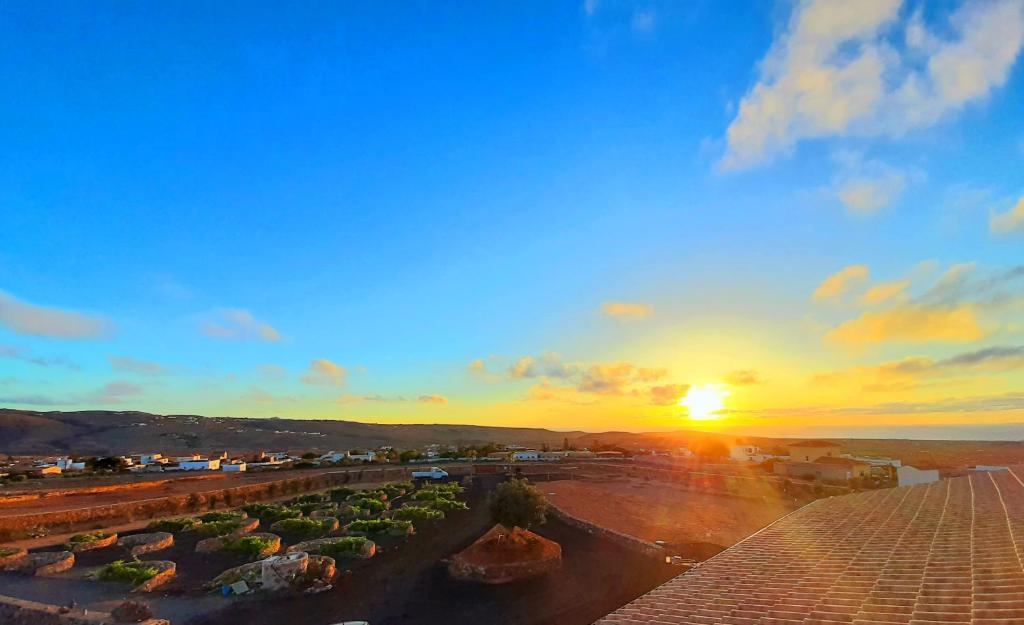 a view of the sunset from the roof of a building at Agriturismo El Bounty1 in Puerto del Rosario