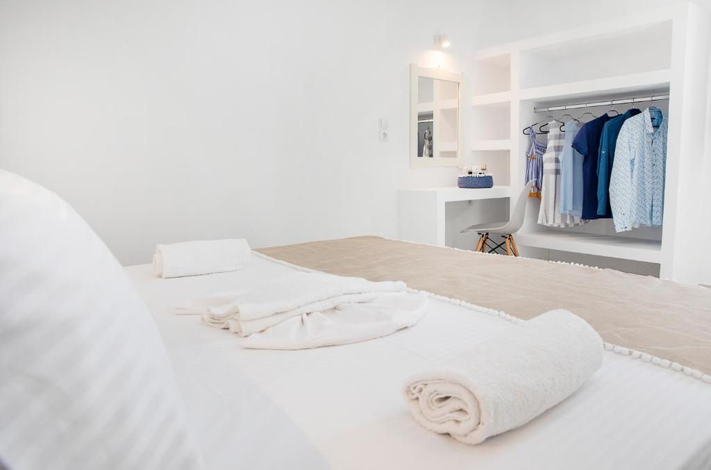 Postel nebo postele na pokoji v ubytování Grozos Rooms