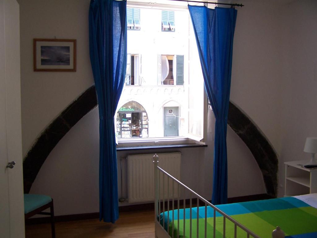 Postel nebo postele na pokoji v ubytování B&B Archi di Borgolungo