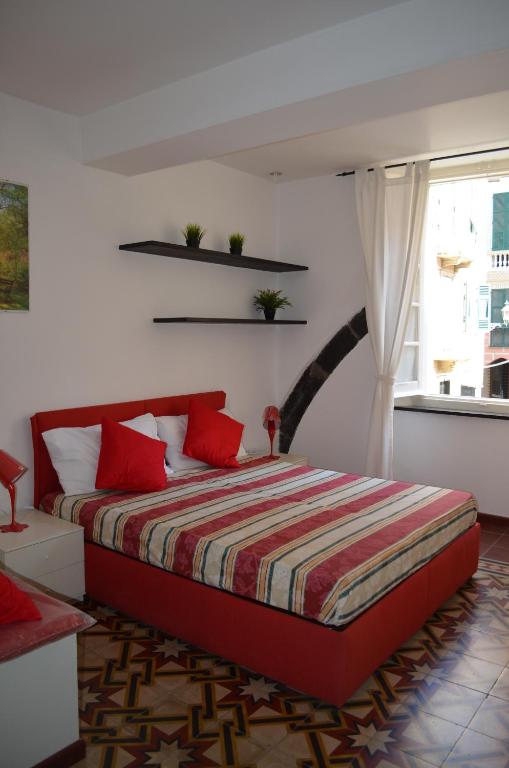 Postel nebo postele na pokoji v ubytování B&B Archi di Borgolungo