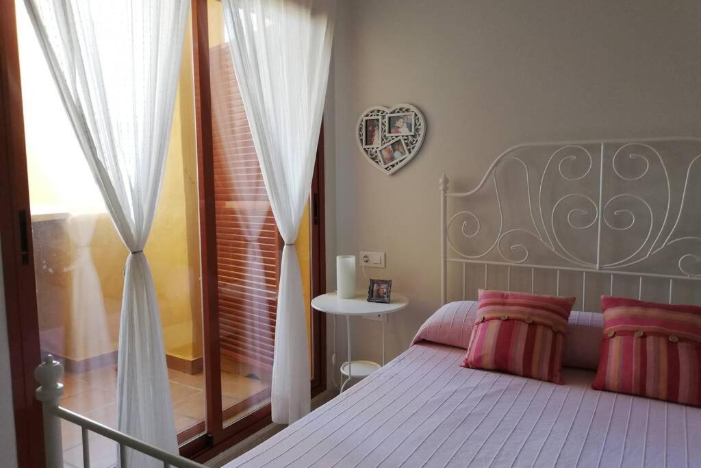Postel nebo postele na pokoji v ubytování Relax en Manilva