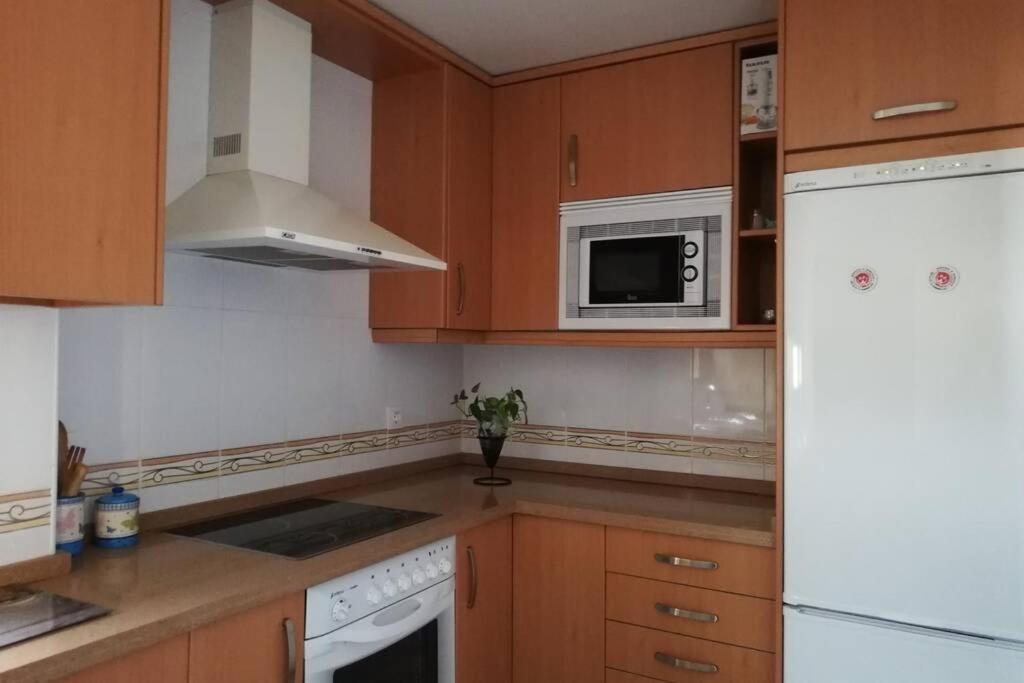 Kuchyň nebo kuchyňský kout v ubytování Relax en Manilva