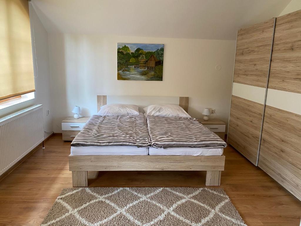 Postel nebo postele na pokoji v ubytování Aqua