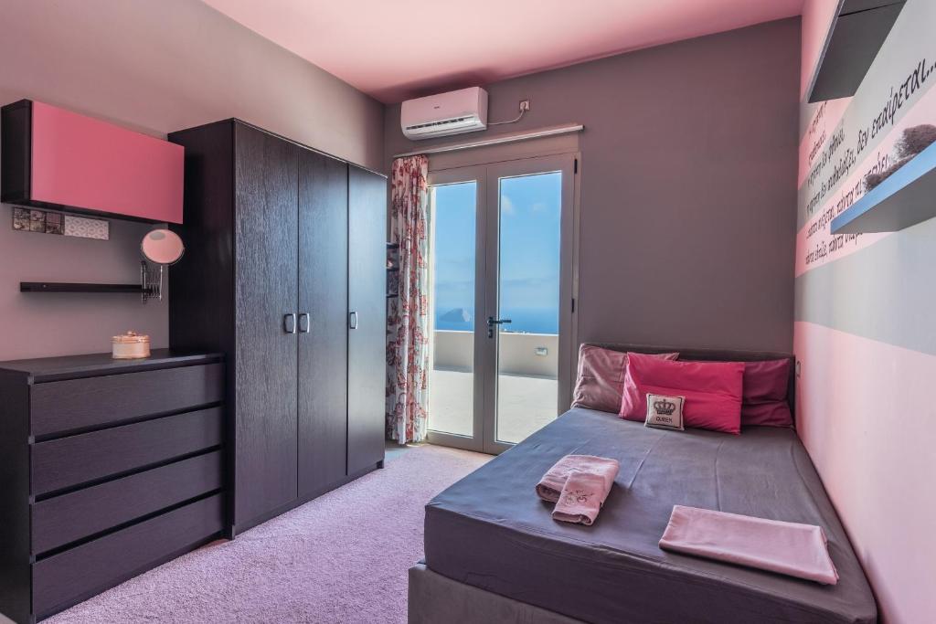 Cama ou camas em um quarto em Villa Iris