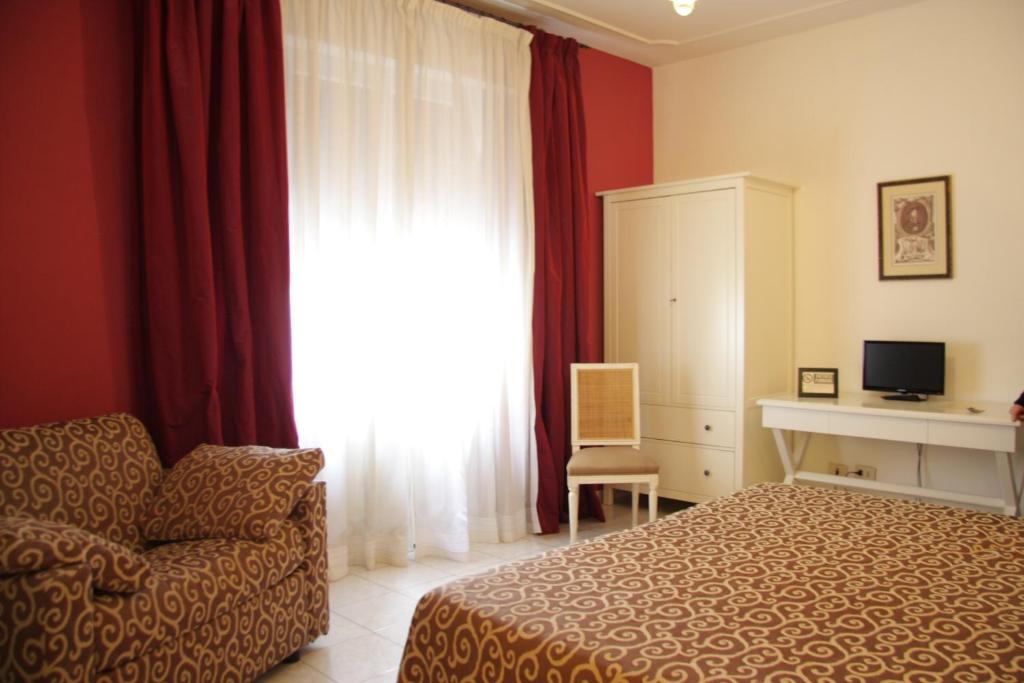TV a/nebo společenská místnost v ubytování Hotel Alex