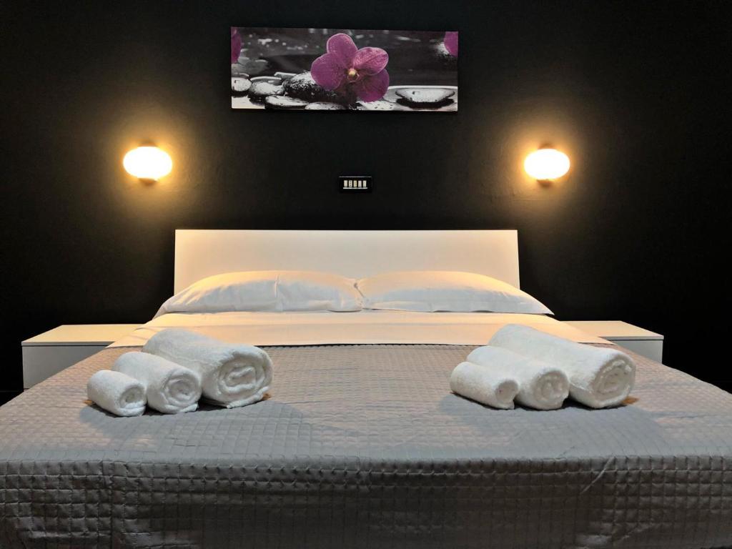 Postel nebo postele na pokoji v ubytování Hotel Neyra Beach
