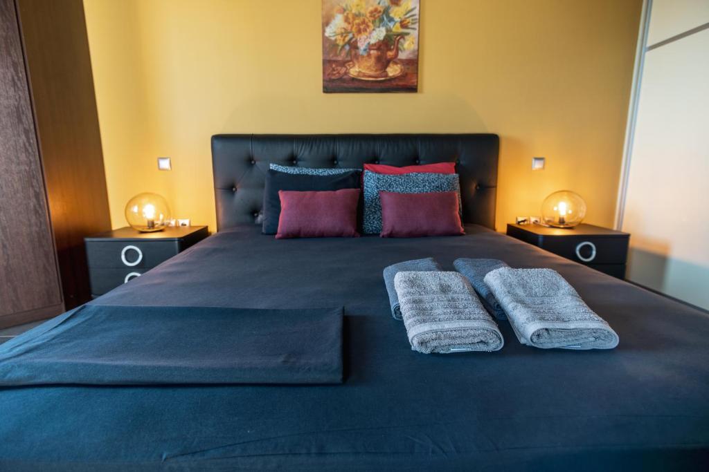 Cama ou camas em um quarto em Villa Iris