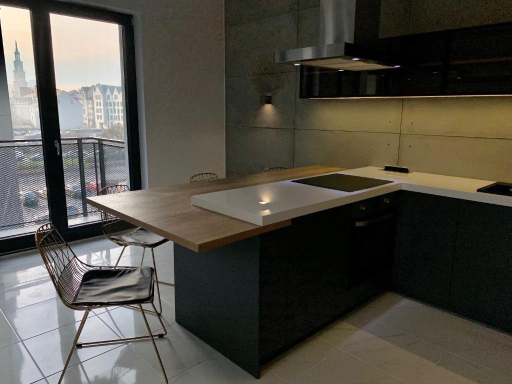 Kuchyňa alebo kuchynka v ubytovaní EL Apartments - Antares