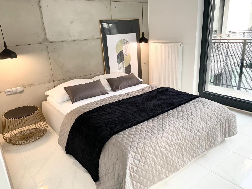 Posteľ alebo postele v izbe v ubytovaní EL Apartments - Antares
